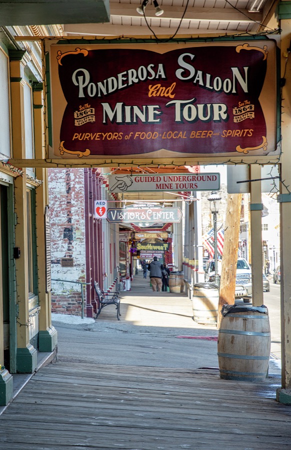 Sign for the Ponderosa Saloon on the boardwalk in remote Virginia City, Nevada