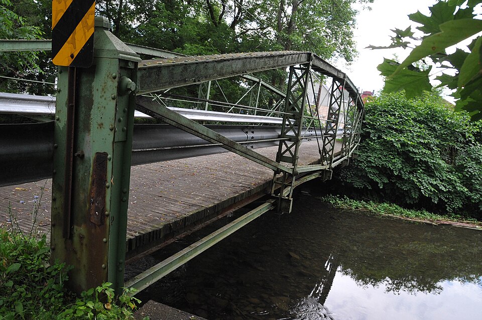 Photograph of Water, Wall, and Pine Streets Lenticular Truss Bridges