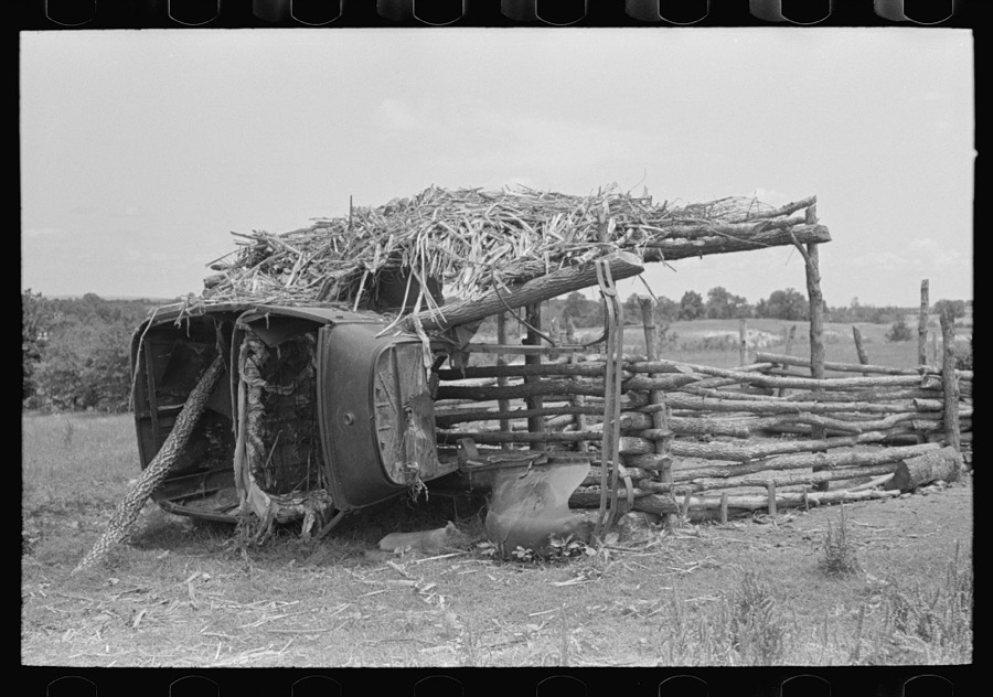 Hogpen of Negro tenant farmer held up by part of an automobile body, Wagoner County, Oklahoma