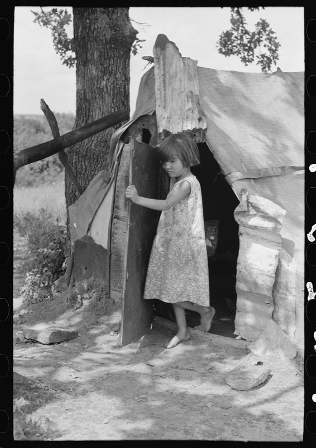 Child of agricultural day laborer coming out of tent near Spiro. Sequoyah County, Oklahoma
