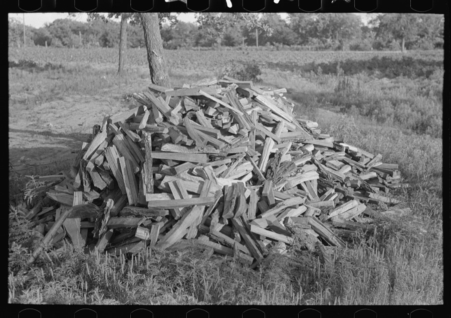 Pile of stove wood of Indian agricultural day laborer, preparing for winter, McIntosh County, Oklahoma