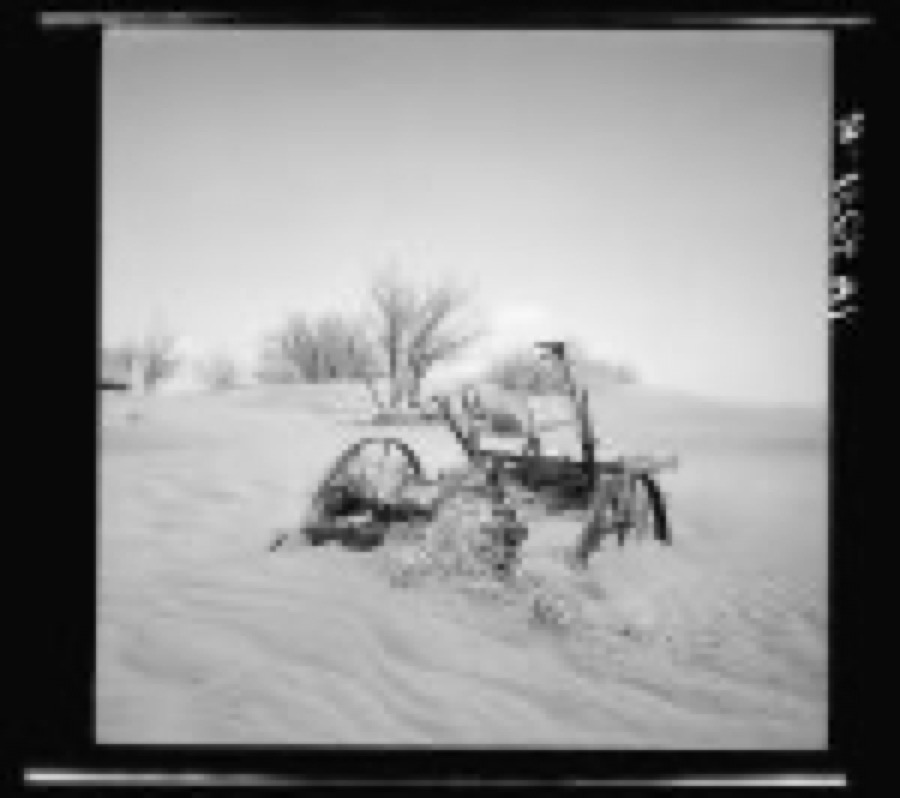 Buried farm machinery. Cimarron County, Oklahoma