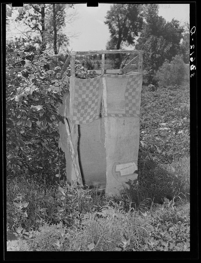 Privy made of Purina Chow sacks, tenant farmer's. Near Sallisaw, Oklahoma
