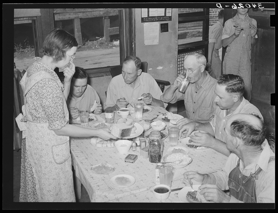 Pickets of striking oil workers' union eating lunch prepared by their wives at union headquarters. Seminole, Oklahoma