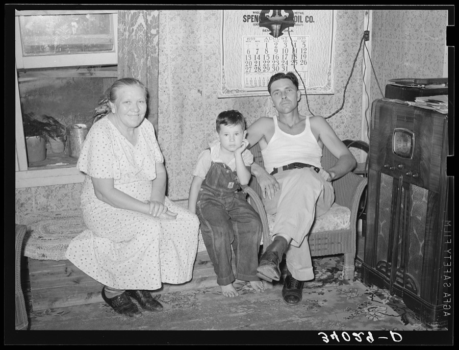 Truck driver, his mother and son at home. Seminole, Oklahoma, oil fields