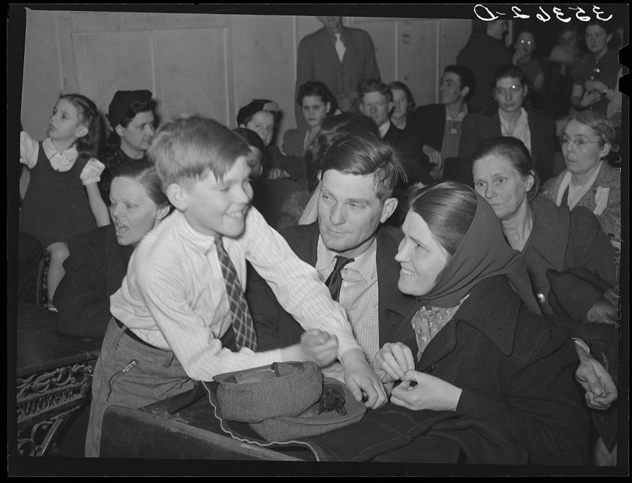 Farm couple with their son at pie supper. McIntosh County, Oklahoma. See general caption number 24