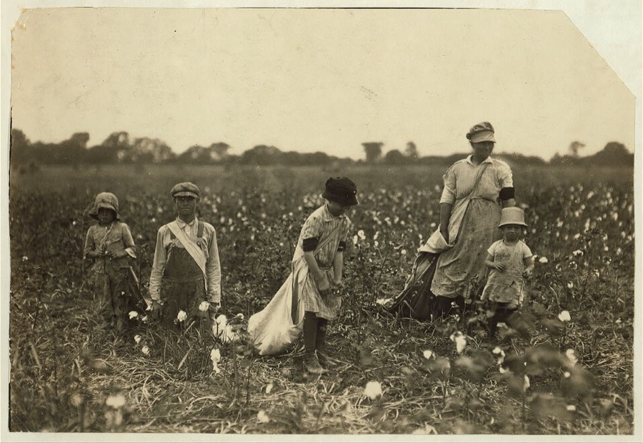 Family of W.T. Frakes, Route 5, Lawton, Okla. Mother said 6-year old Warren picked 41 pounds of cotton yesterday "An I don't make him pick; he picked last year." Had about 20 pounds in his bag. She said Clara, 11 years old, averages 75 pounds a day. Picked 101 pounds yesterday, earning $1.25 (they are picking now for another farmer). She carries 40 pounds in the bag. Velma, 14 years, picks 125 pounds. Has picked over 200 pounds in a day. Children go to Flower Mound School, District 48 while living here, but they are itinerant, renting a small farm of 10 acres now. "We move about a good deal" mother said.  Location: Comanche County, Oklahoma