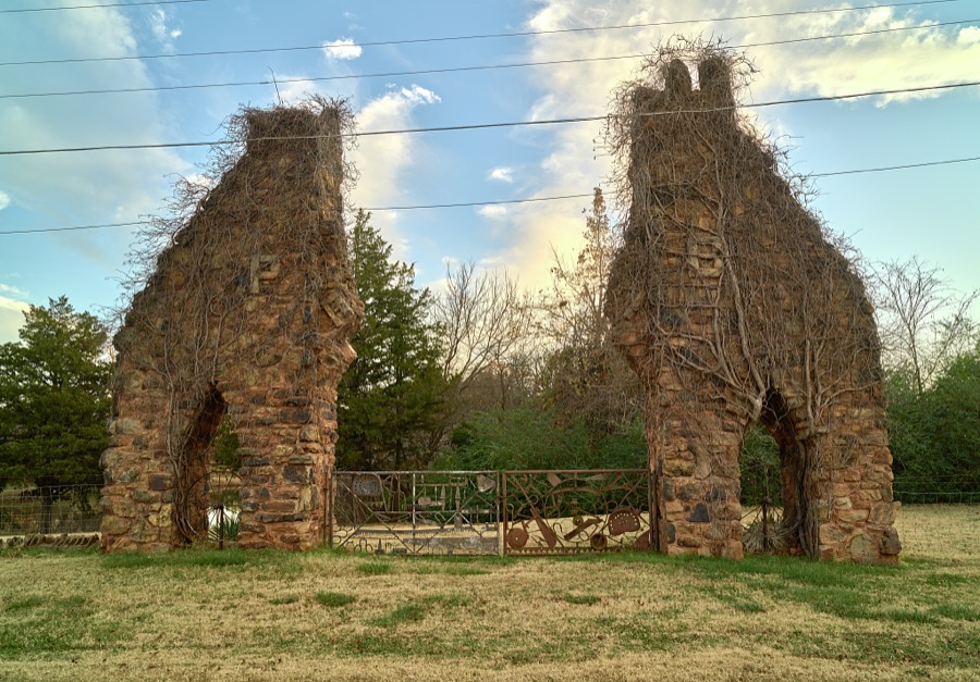 A vine-covered original gateway to the Pawnee Bill Ranch and Museum in Pawnee, the seat of Pawnee County, Oklahoma, much of which is also part of the overlapping Pawnee Nation of American Indians