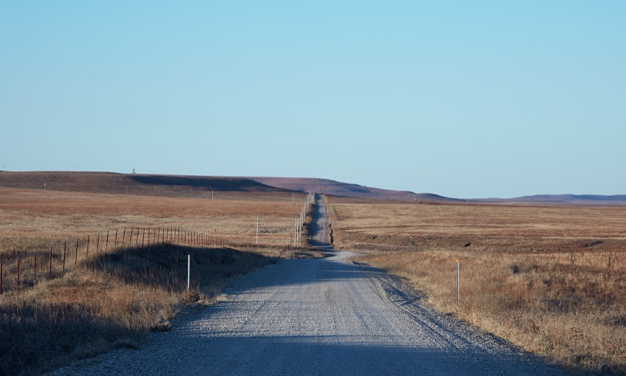 Gravel road through the Joseph H. Williams Tallgrass Prairie Preserve, owned and managed by the Nature Conservancy near the town of Foraker, in Osage County, Oklahoma