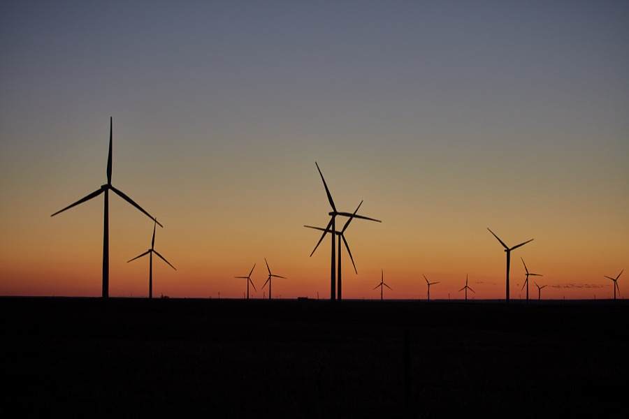 The sun sets on a "wind farm" of turbines near Burbank in Osage County, Oklahoma