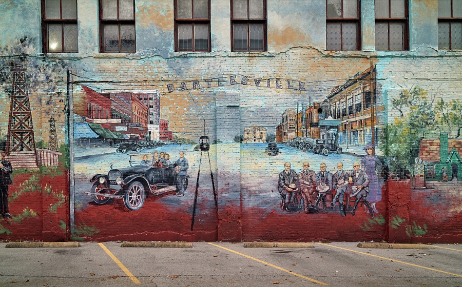 A prolific Oklahoma artist, Dr. Bob Palmer, led the team that created this elaborate historic mural in Bartlesville, Oklahoma