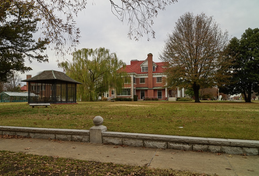 Side view of the Frank Phillips Home and a screened-in enclosure in Bartlesville, Oklahoma