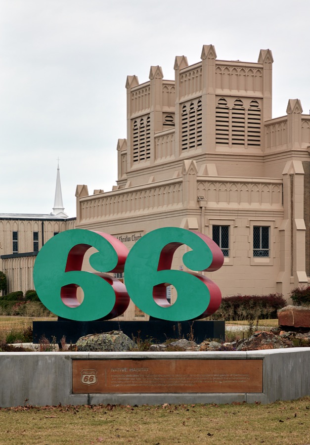 The "66" sign in the Ted & Melody Lyon Pavilion between the First Methodist Church and Frank Lloyd Wright's famous Price Tower in downtown Bartlesville, Oklahoma
