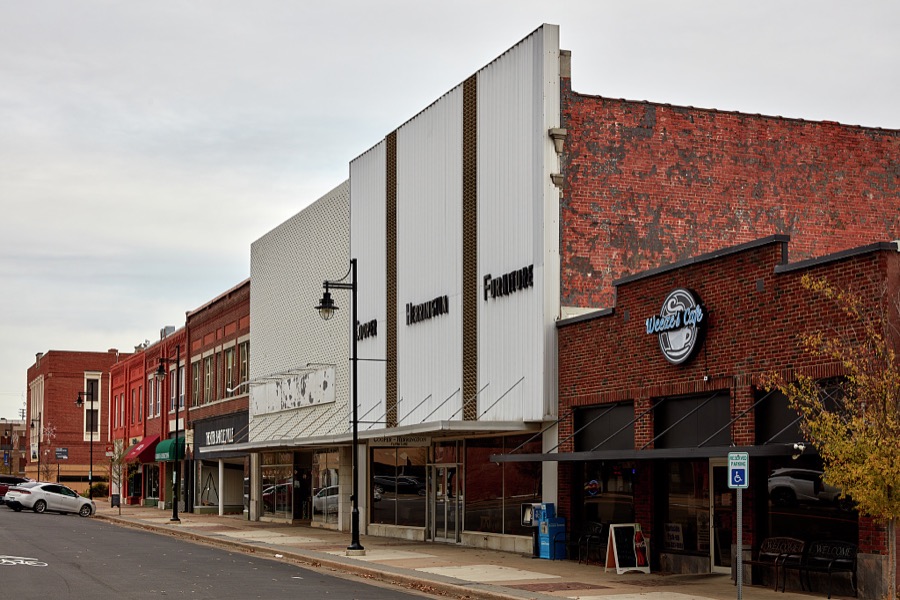 Two buildings in this block of Bartlesville, Oklahoma, chose what was once (in the 1970s, in particular) a popular renovation technique for older downtown brick structures