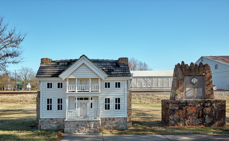 Side-by-side references in the town of Oologah, Oklahoma, to renowned American humorist Will Rogers