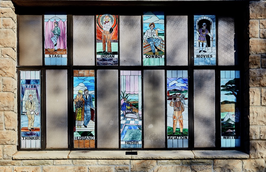 A stained glass-window, whose artistic panels recount many of Will Rogers's life roles, at the memorial museum dedicated to the legendary American humorist, beloved as "America's cowboy philosopher," in Claremore, Oklahoma