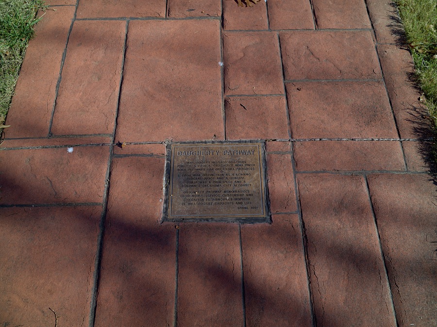 Sidewalk plaque to brothers Philip and Fred Daugherty, friends of Will Rogers, at the Rogers Birth Home site, near Oologah, Oklahoma