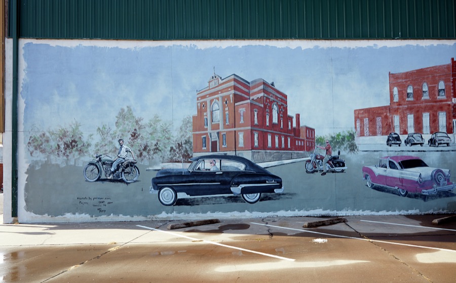 One of three panels on a local historical museum in Anadarko, a small city in southwest Oklahoma that (as of 2020) has been struggling with dropping population, increasing unemployment and a downturned local economy