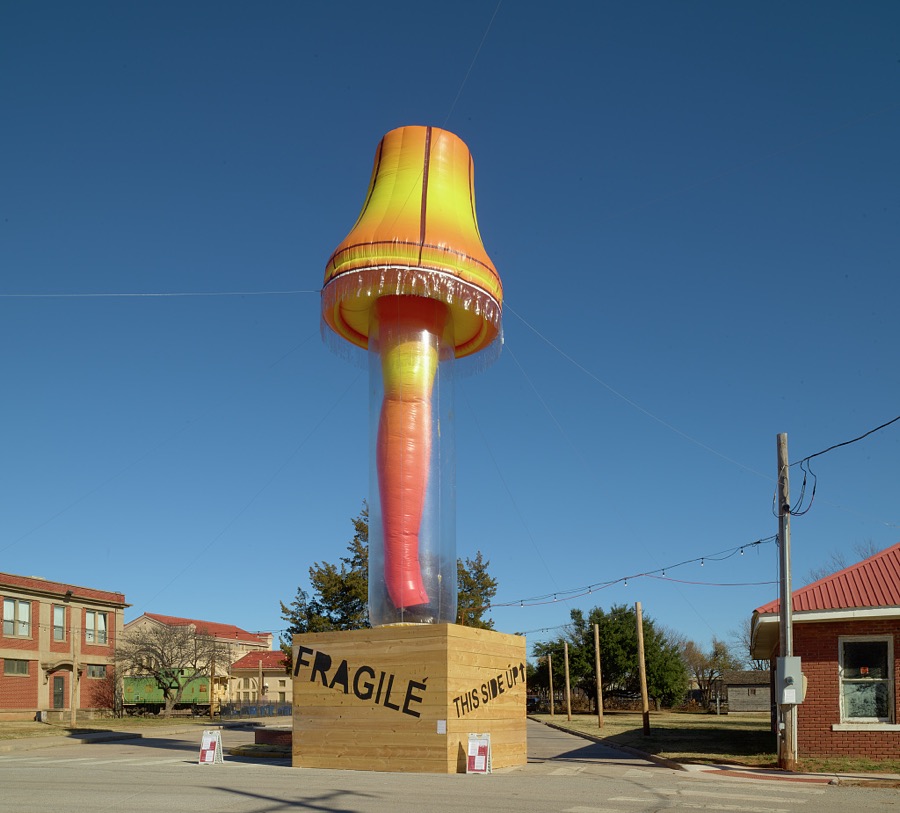 Yes, that is a giant, inflatable object in the shape of not only a lamp but also a woman's leg, prominently displayed in downtown Chickasha (pronounced CHICK-a-shay), Oklahoma