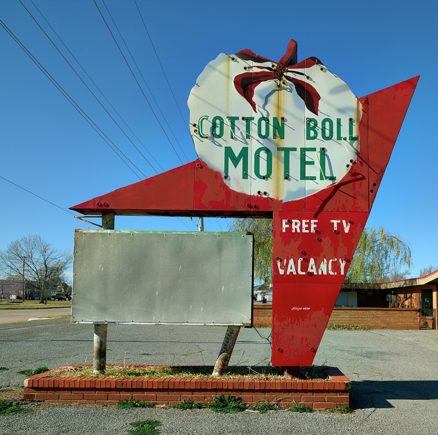 Outdoor sign for the old Cotton Boll Motel (the building or buildings themselves are gone) in Canute, Oklahoma