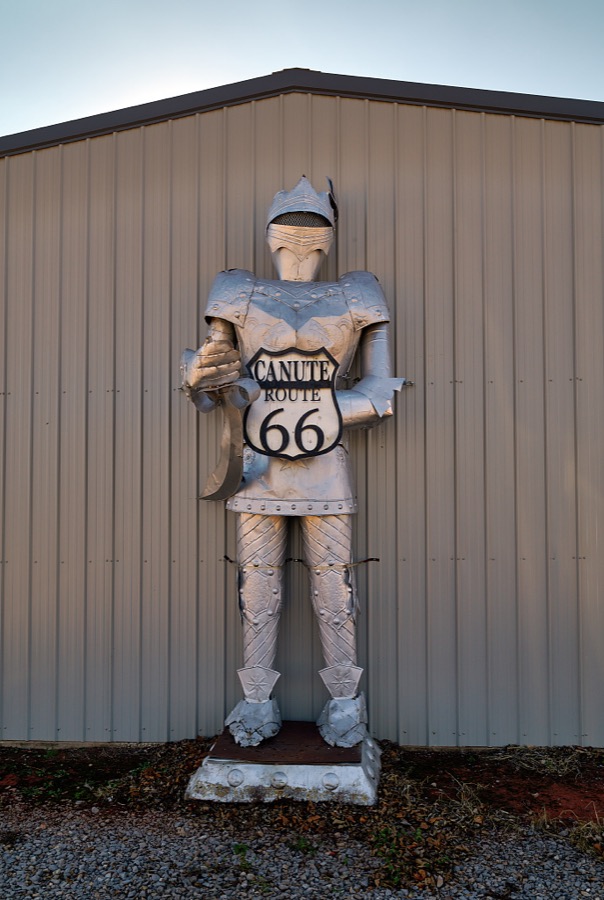 If you wonder where you are as you drive by in Canute, Oklahoma, this knight in dull armor holding a sign denoting the historic U.S. route 66 highway will tell you