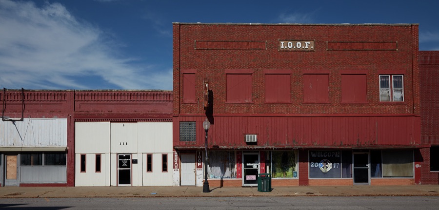 A block of mostly vacant downtown stores in Anadarko, a small city in southwest Oklahoma that (as of 2020) has been struggling with dropping population, increasing unemployment and a downturned local economy