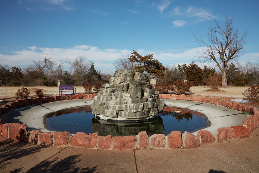 Pond and rock formation on the grounds of the National Hall of Fame for Famous American Indians in Anadarko, a small city in southwest Oklahoma that includes the headquarters of the Apache Tribe of Oklahoma