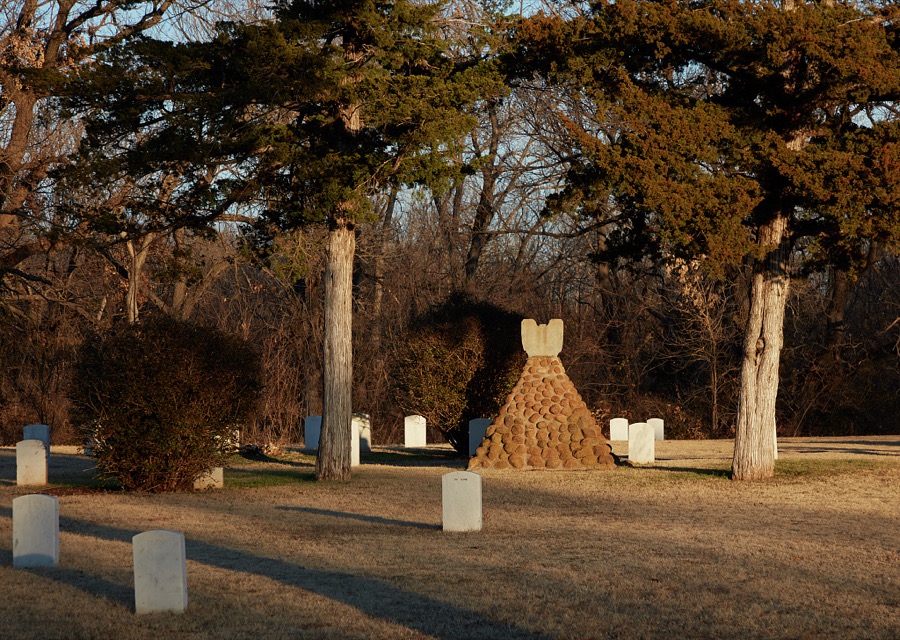 The stone pyramid gravesite of the Chiricahua Apache leader and medicine man Geronimo (back row) at Fort Sill, an extensive United States Army post north of Lawton, Oklahoma