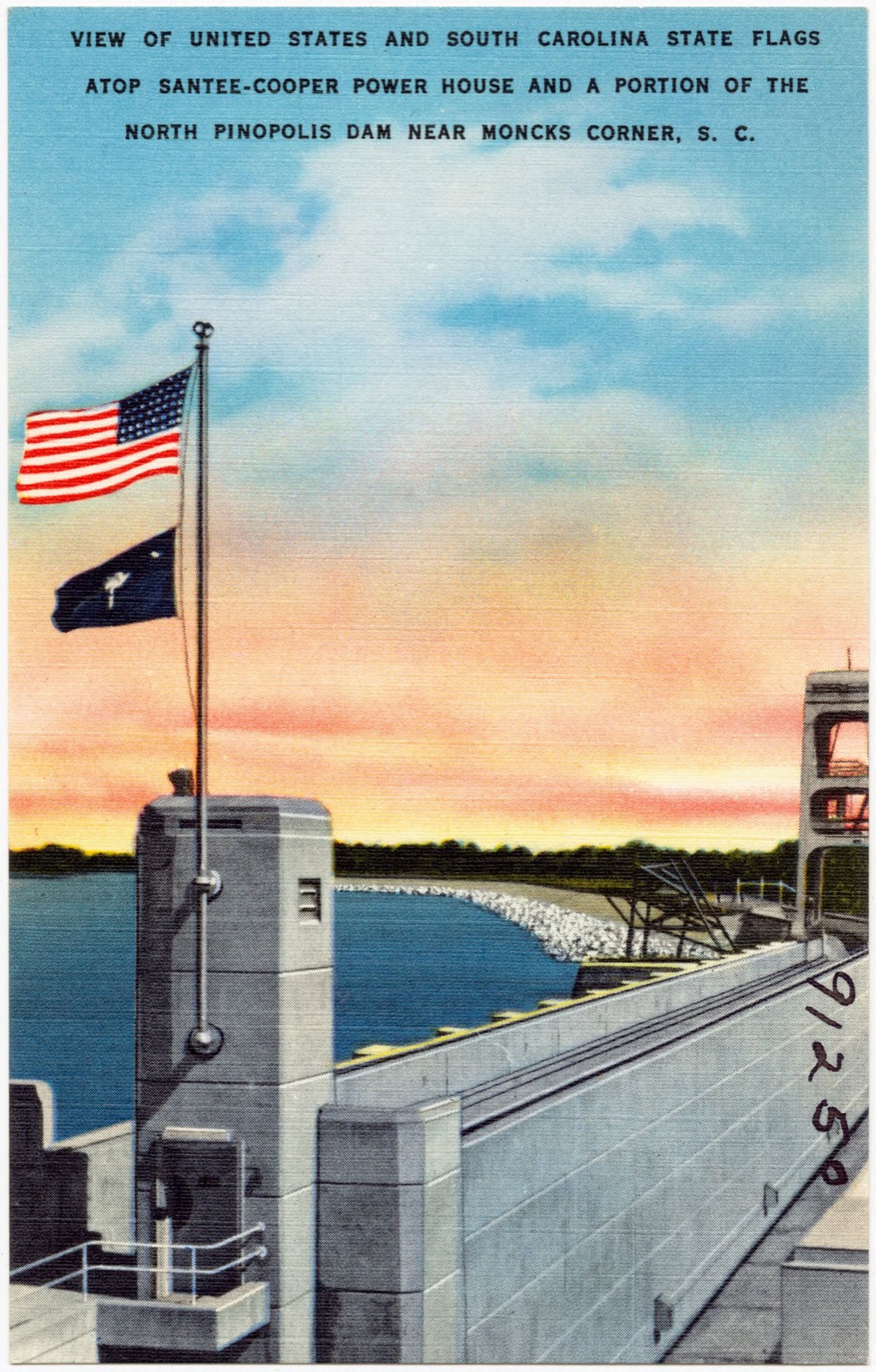 View of United States and South Carolina State flags atop Santee-Cooper Power House and a portion of the North Pinopolis Dam near Moncks Corner, S. C., Boston Public Library - undated