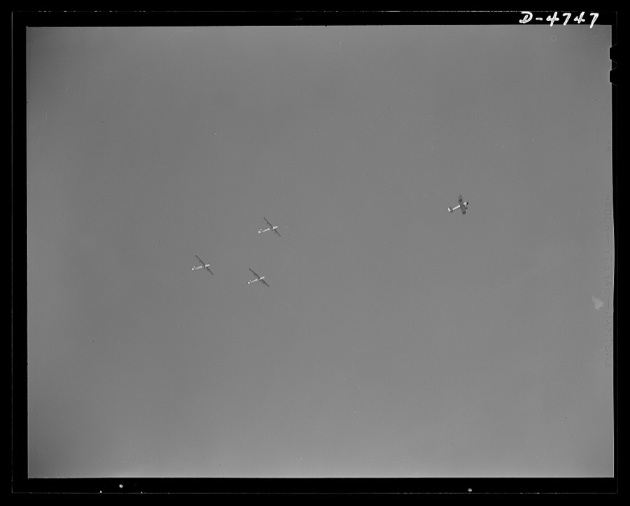 Parris Island. Marine Corps gliders. Leave it to the Marines to make the best of all the new fighting tools. Gyrene glider pilots in training at Page Field, Parris Island, South Carolina take a six-week course during which each student must complete 1000 successful takeoffs and landings. The plane is towing the three gliders