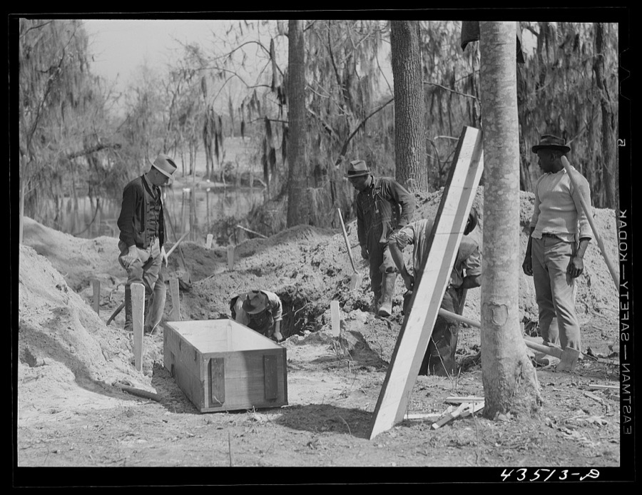 Digging out a cemetery to be moved from the Santee-Cooper basin. Near Bonneau, South Carolina