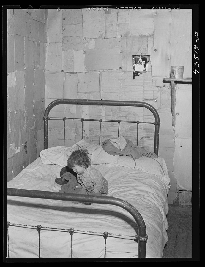 In the home of a "squatter" family that was preparing to move off the Camp Croft area. Near Whitestone, South Carolina