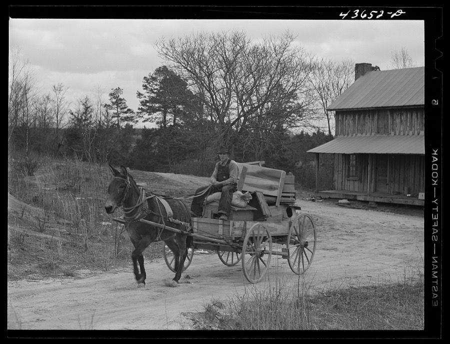 Tenant farmer moving the last load of his belongings out of the Camp Croft area near Pacolet, South Carolina