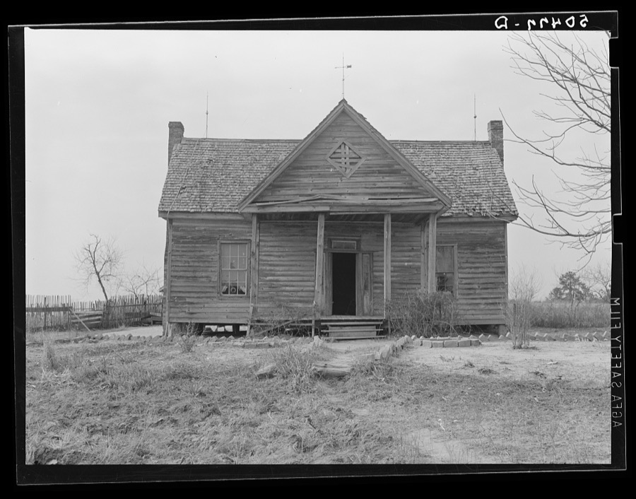 Typical of better home once owned by white people, but for past ten years owned by Negro woman who hasn't money to keep it repaired. Monticello Road, near Columbia, South Carolina