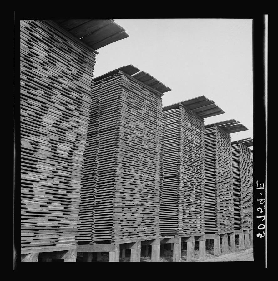 Stacks of lumber at sawmill. Ashepoo, South Carolina