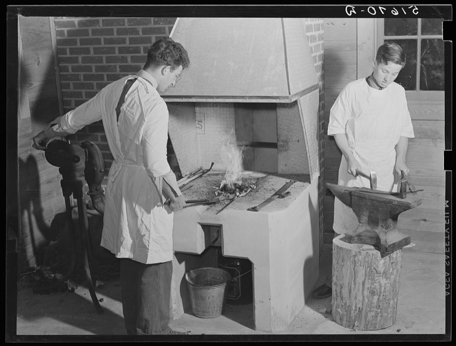 Hugh Stafford and Darwin Elmore at forge in shop at school. Ashwood Plantations, South Carolina