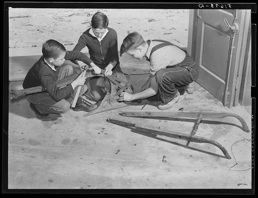 L.O. Baker, Clarence Le Grand and Jack Myers repairing plough in shop class at Ashwood Plantations school, South Carolina