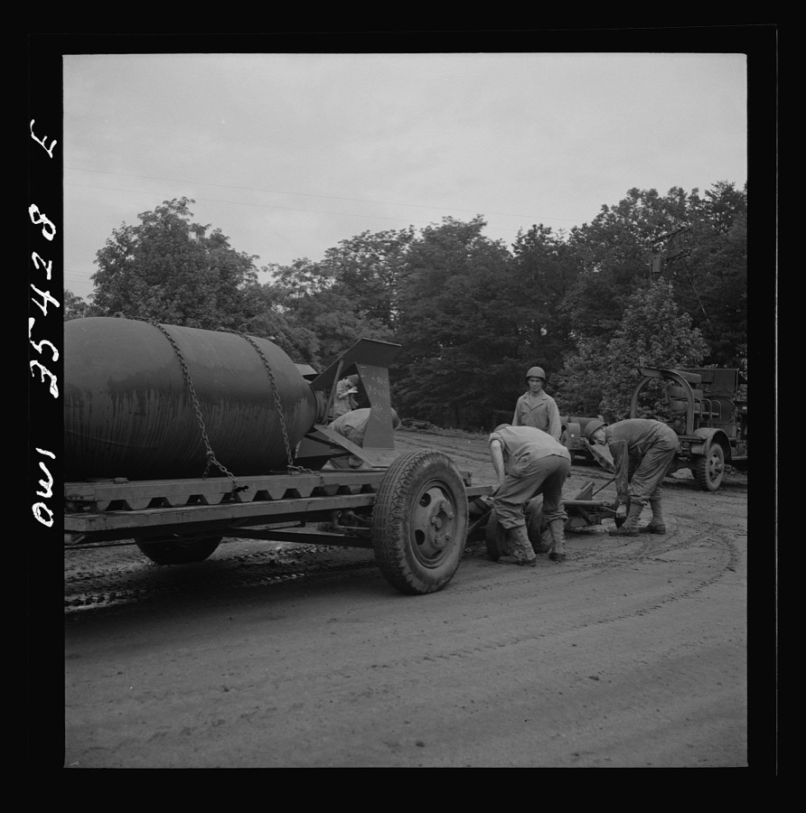 Greenville, South Carolina. Air Service Command. Men of the 1756th ordnance supply and maintenance company removing the fins of a 4000 pound bomb