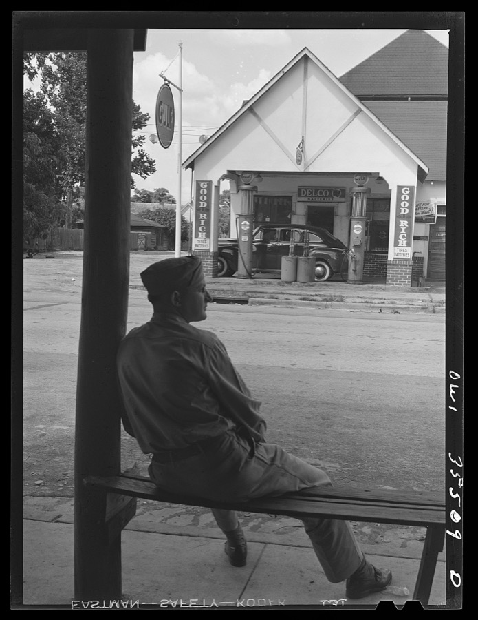 Bowman, South Carolina. Sergeant John Riley, of the 25th service group, Air Service Command, home on leave. Across the street is his father's garage, where he used to work