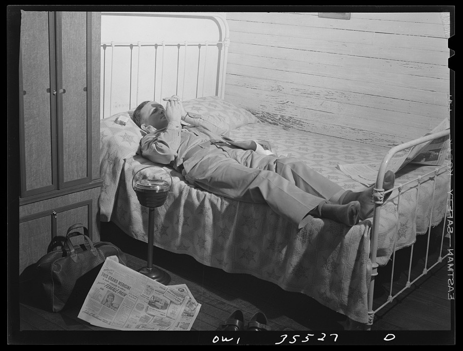 Bowman, South Carolina. Sergeant John Riley, of the 25th service group, Air Service command, home on leave talking things over with his brother Howard