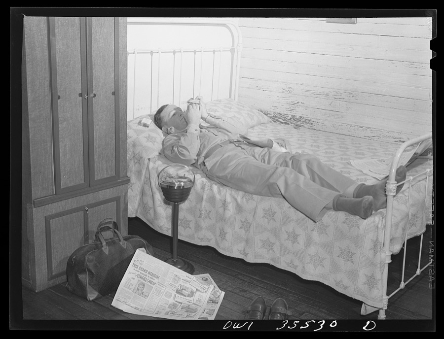 Bowman, South Carolina. Sergeant John Riley, of the 25th service group, Air Service command, home on leave talking things over with his brother Howard