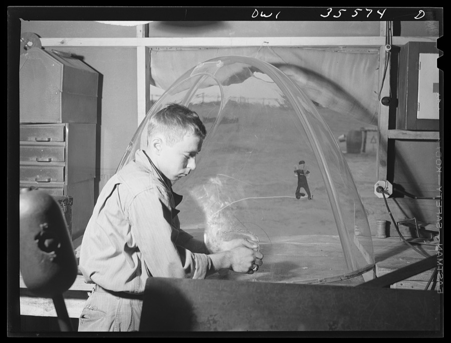 Greenville, South Carolina. Air Service Command. Repairing a break in the plexiglass nose of a B-26 bomber