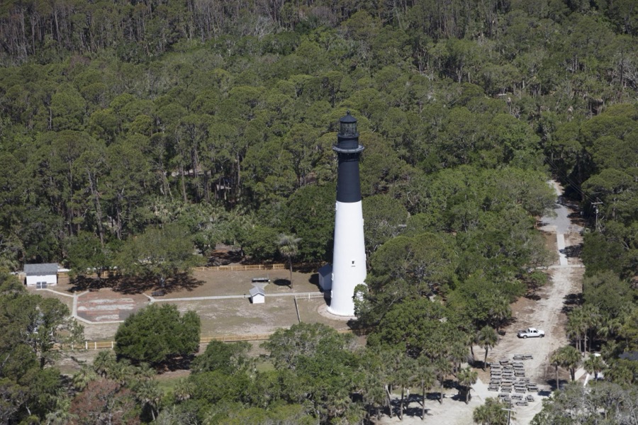 Aerial view of the Hunting Island Lighthouse on the island of the same name in Beaufort County, South Carolina. The Hunting Island lighthouse was constructed in 1859 and is the only lighthouse in the state of South Carolina that is open to the public