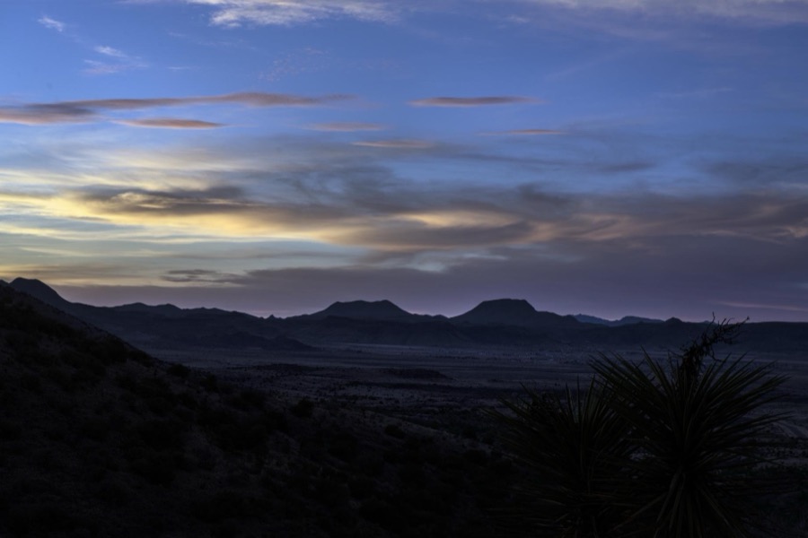 Sunset over the low mountains in the rugged terrain north of Big Bend National Park in the "Trans-Pecos" region of southwest Texas