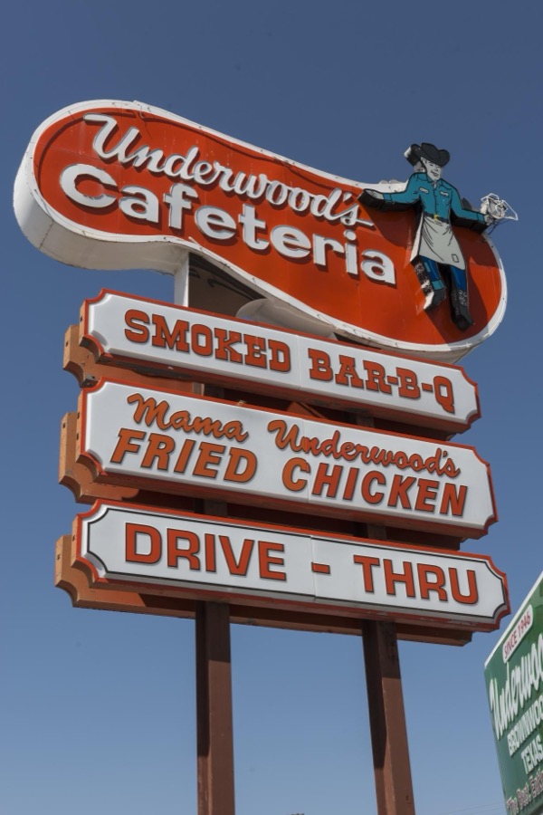 Street sign for a barbecue restaurant in Brownwood, the seat of Brown County in Central Texas. Texas vies with North Carolina and the city of Kansas City as avowed "barbecue capitals" of the country