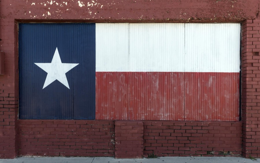 Texas flag, painted on boarded-up window in Brownwood, the seat of Brown County in Central Texas