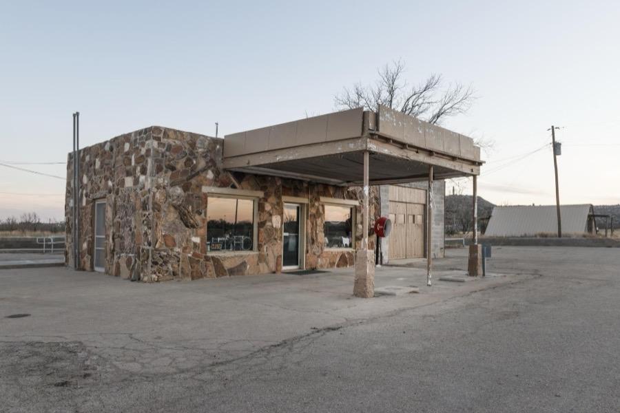 A onetime gas station and cafe, partially made of large stones in the West Texas vernacular, in the town of Gail, seat of Borden County, Texas