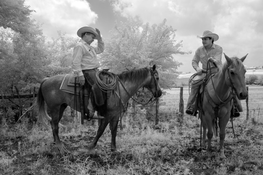 Cowhand Lars Hollis, right, and John Elick, owner of the 1,800-acre Lonesome Pine Ranch, a working cattle ranch that is part of the Texas Ranch Life ranch resort near Chappell Hill in Austin County, Texas
