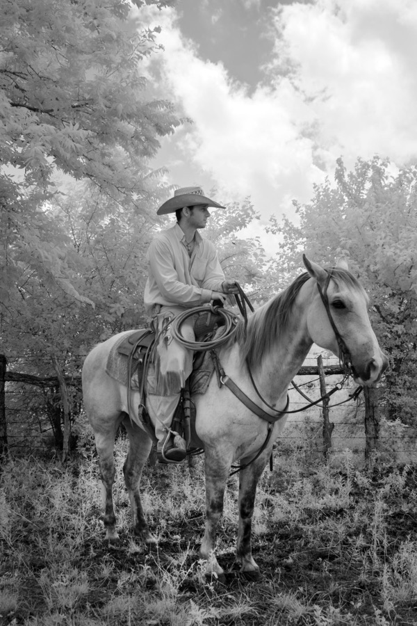 Cowhand Robert Vaughn aboard his horse, Dunnie, at the 1,800-acre Lonesome Pine Ranch, a working cattle ranch that is part of the Texas Ranch Life ranch resort near Chappell Hill in Austin County, Texas