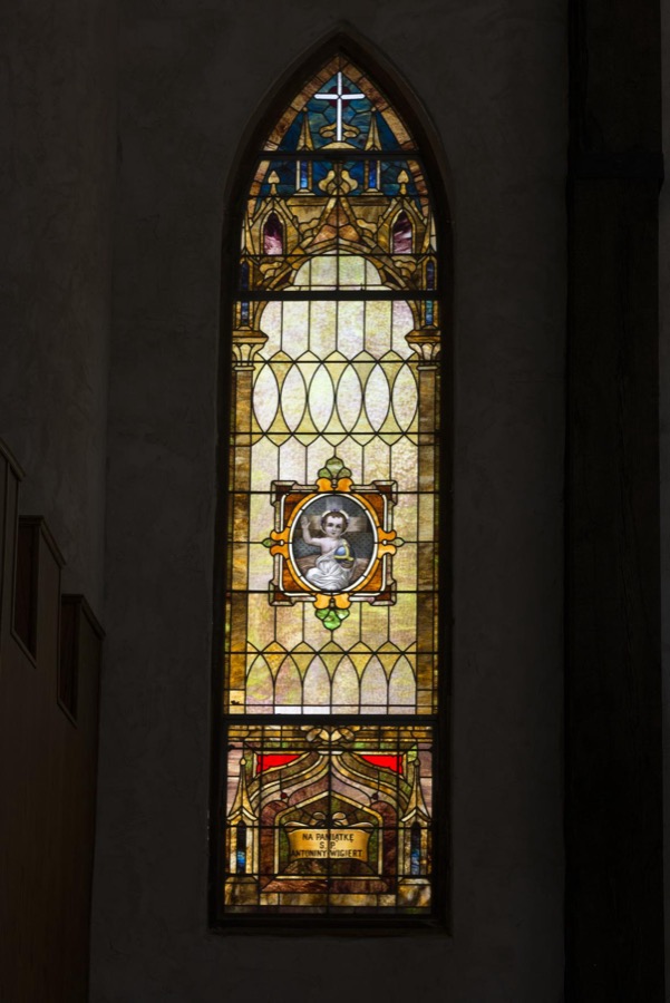 Small stained-glass window inside Falkenstein Castle, built from scratch as a residence by Kim and Terry Young in the hills below Burnet in the Texas Hill Country